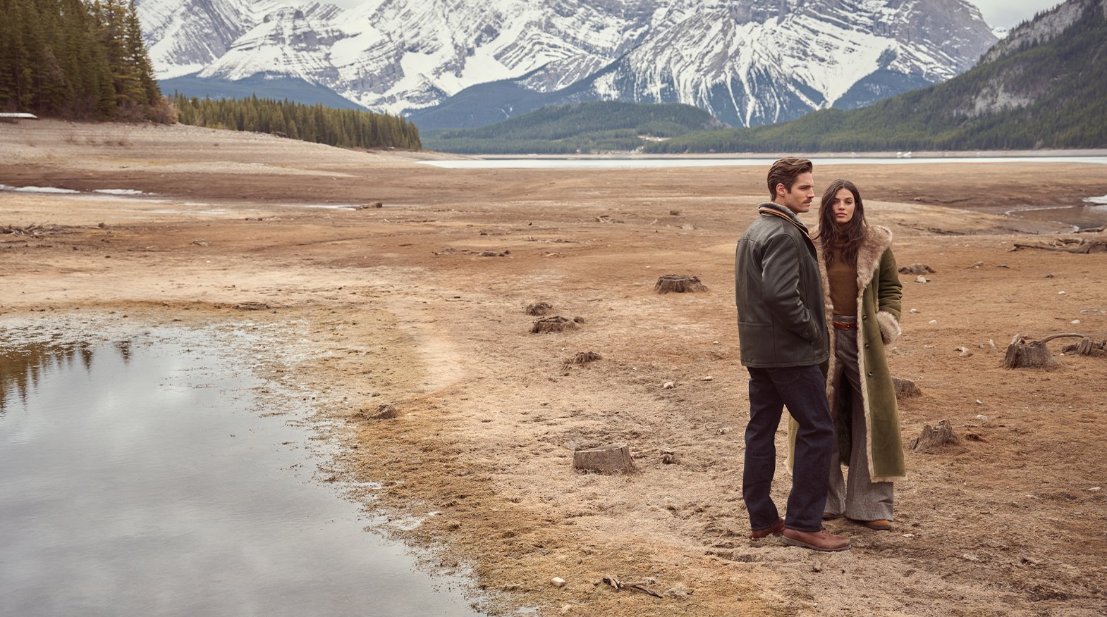 Couple wearing sheepskin coats